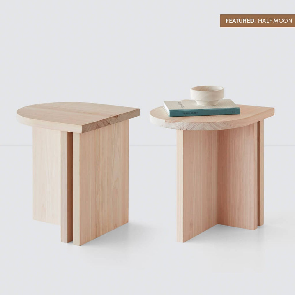 https://www.the-citizenry.com/cdn/shop/products/Hinoki_Wood_Side_Table_Half_Moon_11_With_Label_e156a51d-6eb5-4f62-baa7-42833c446e7c.jpg?format=webp&v=1670014132&width=1000