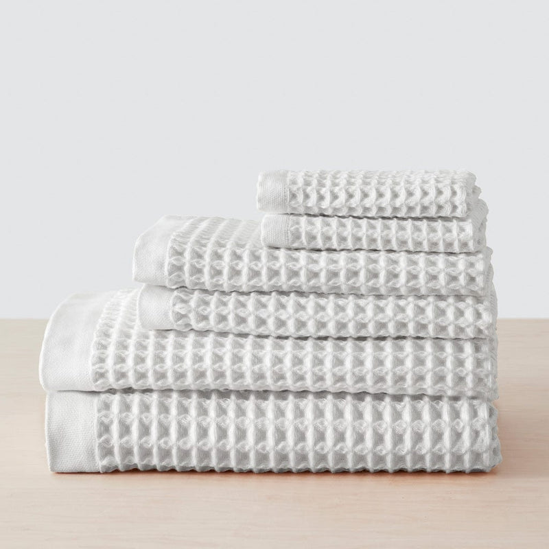 https://www.the-citizenry.com/cdn/shop/products/Imabari_Waffle_Towel_White_17_a3a40e53-a58d-4699-b123-dad3b5341f2b.jpg?format=webp&v=1656118325&width=800