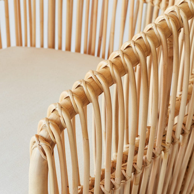 Detail of rattan chair arm, natural